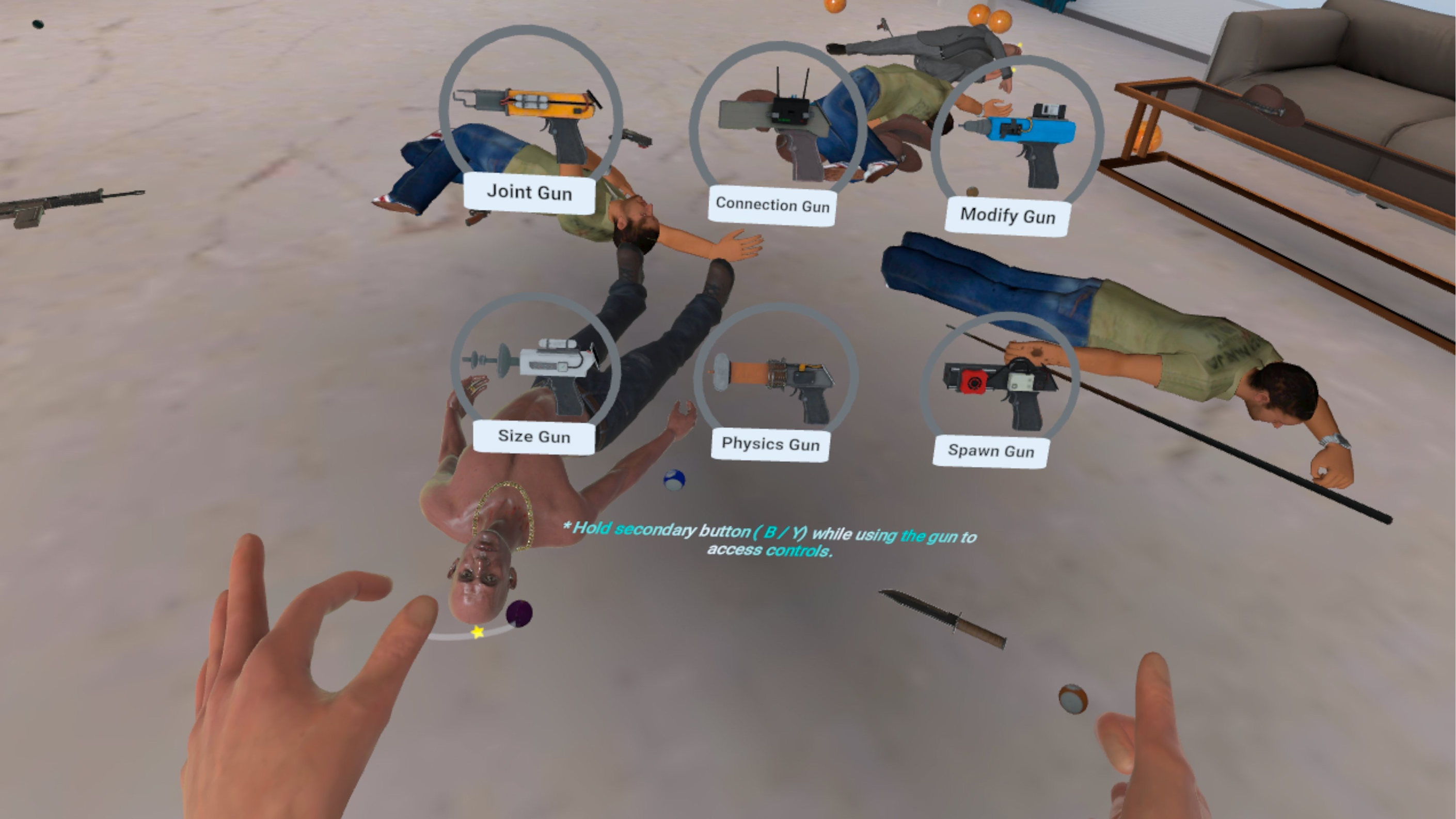 Original tool wheel with six thin grey circles floating over a physics scene of ragdolls and furniture, each with a small white label chip and an italic cyan instruction line across the middle